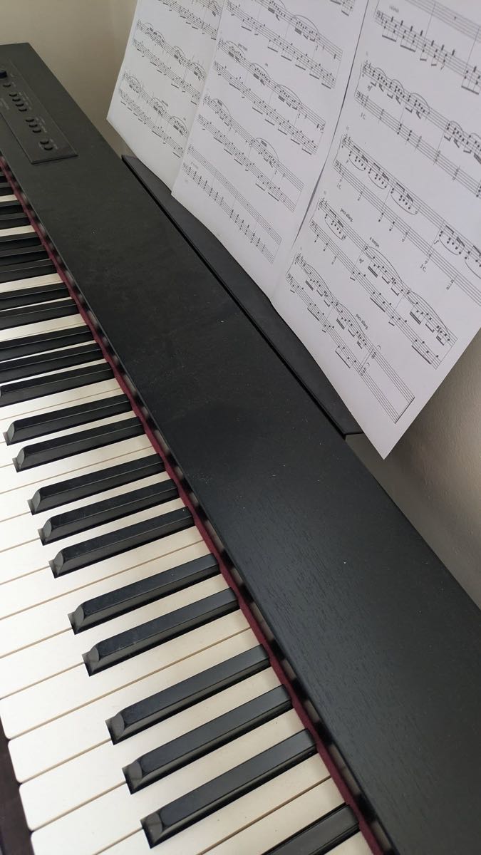 Keyboard with sheet music